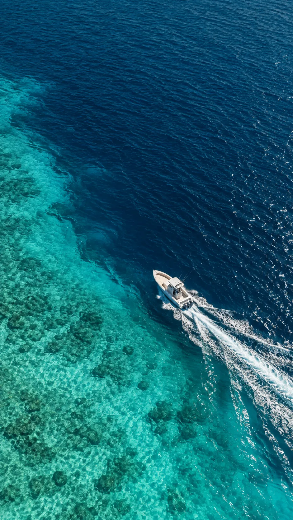 Illustrative boat crossing a visible change in underwater structure